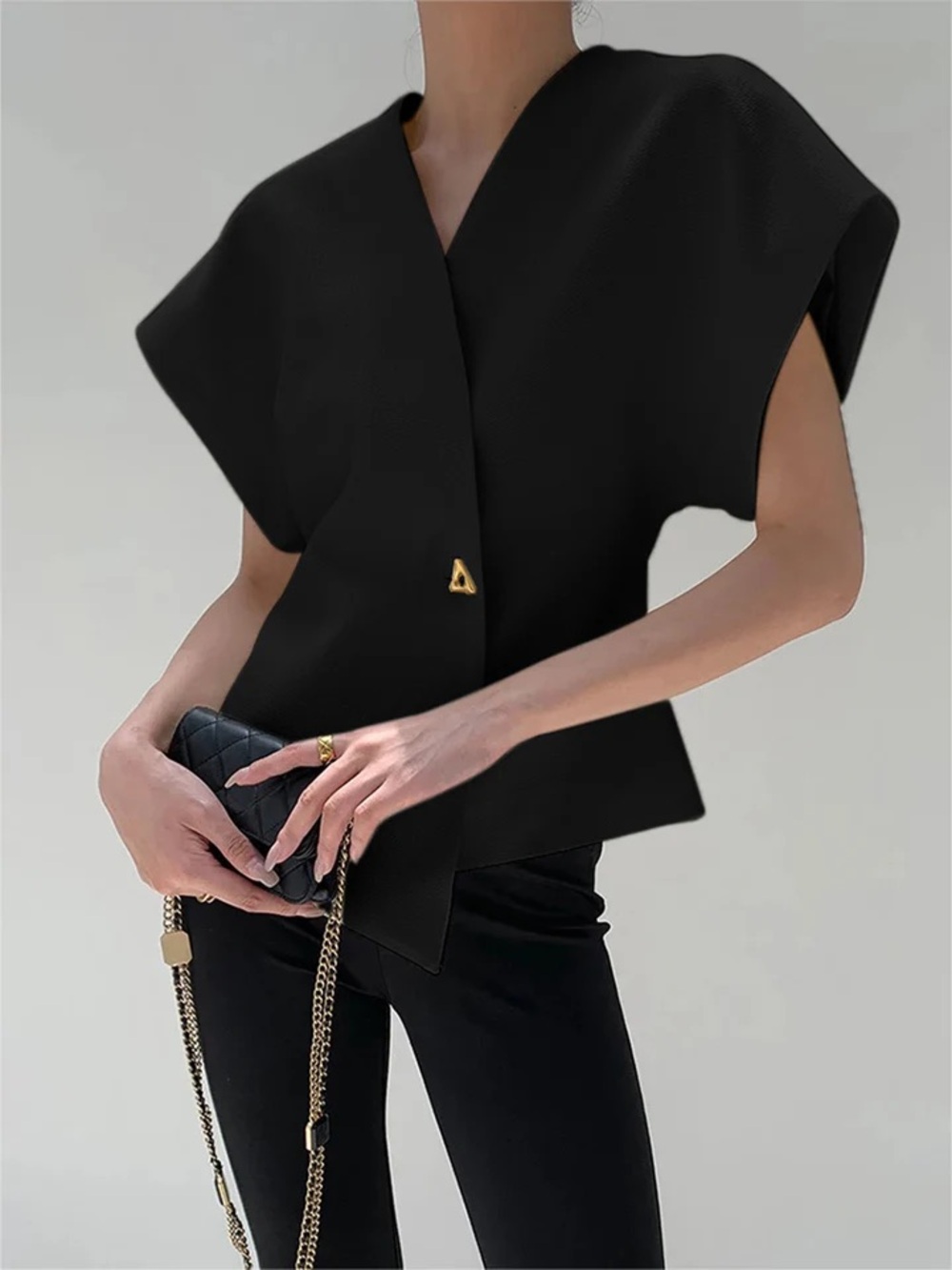 Commense Black Structured V-neck Cap-Sleeve Top with Gold Accent